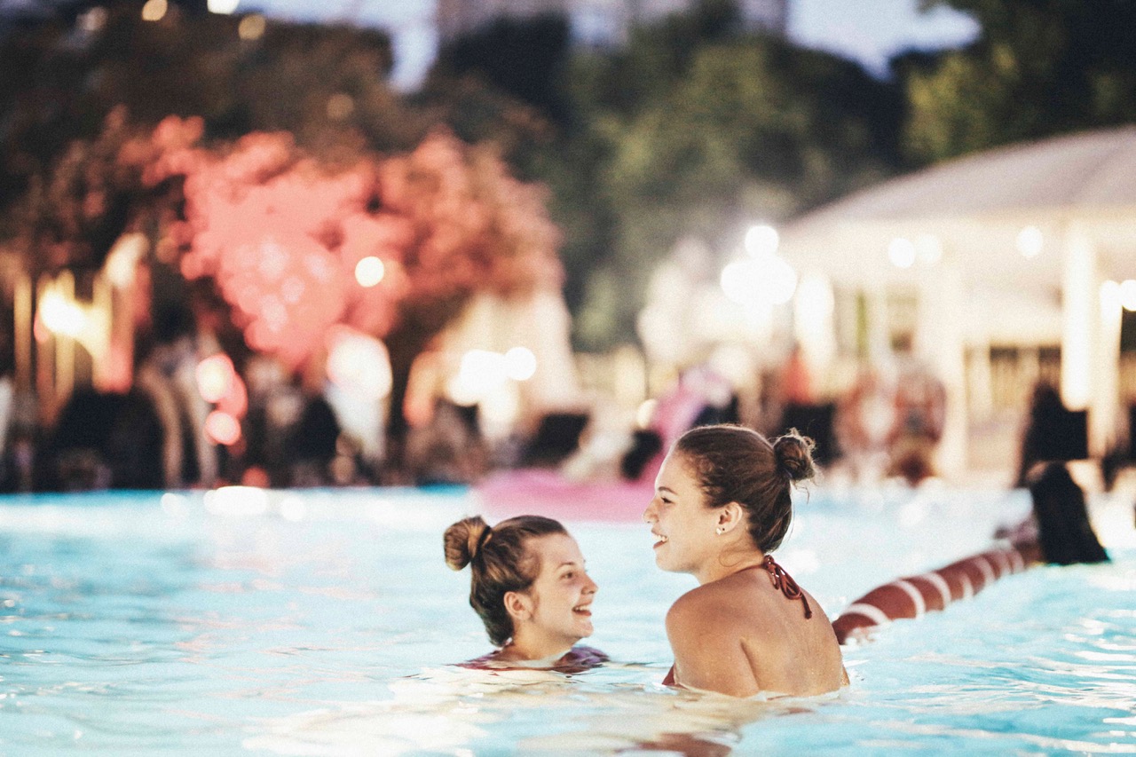 Swimmers inside the Gece Yüzmeleri night-time pool