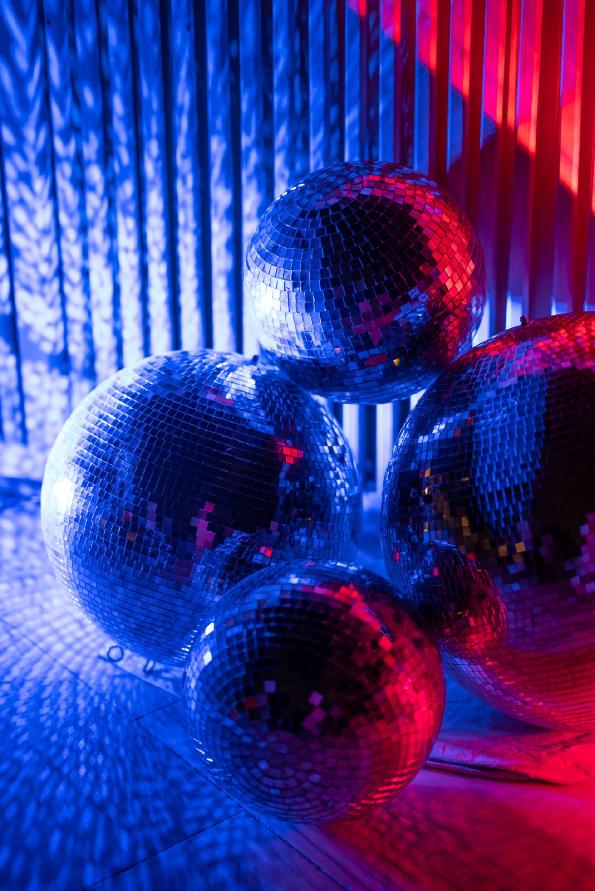 Disco balls in the blue and red KULÜP light environment
