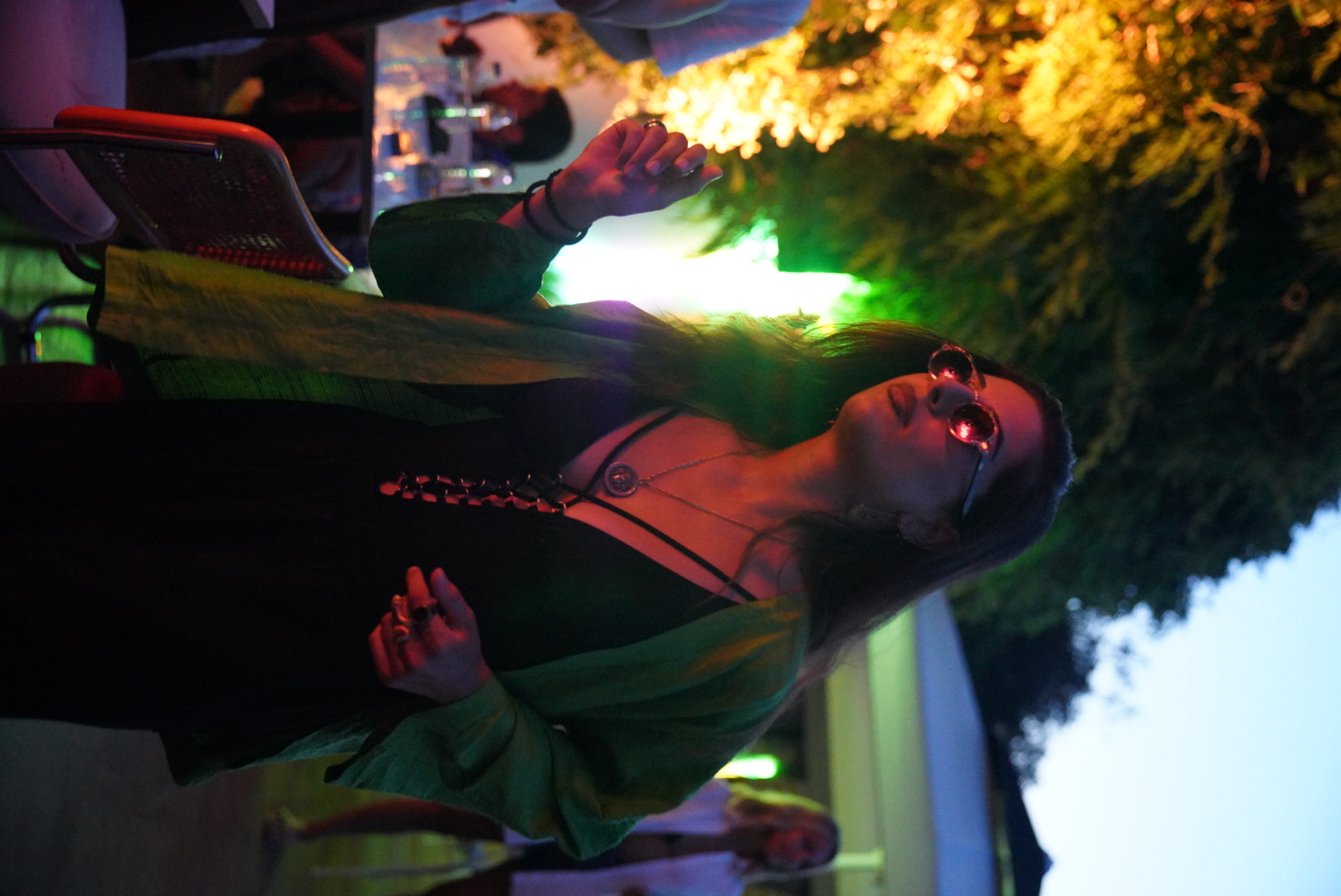 A SUNDAZE guest dancing as daylight turns into night in Bebeköy